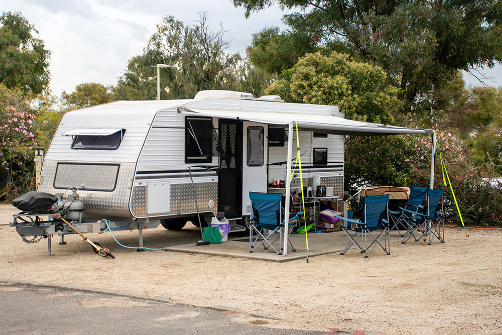 Caravan set up at campsite.