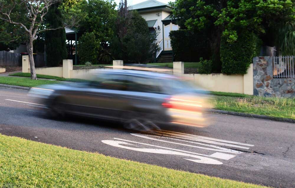 speeding car whizzing by