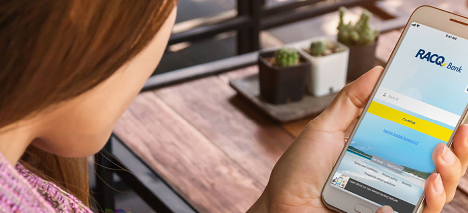Lady using RACQ banking app