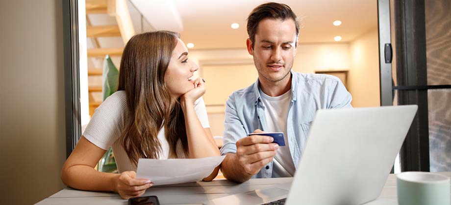 Couple online laptop