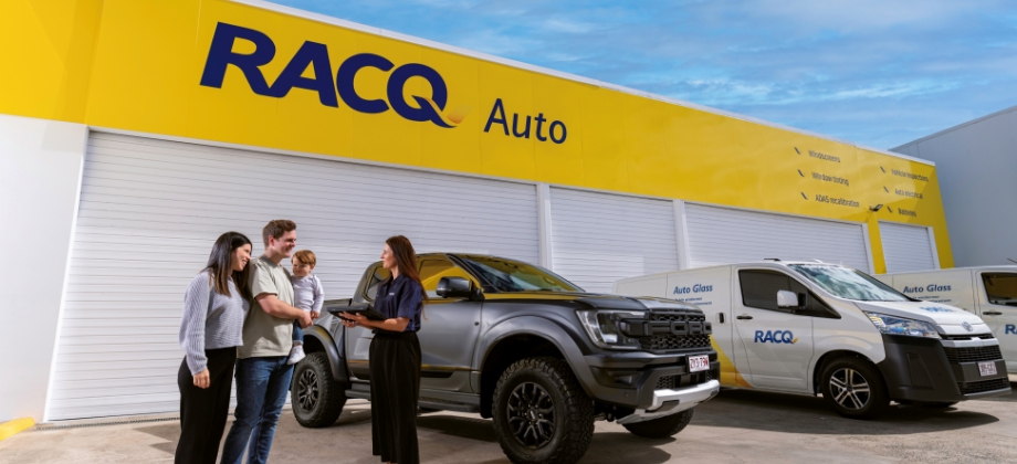 RACQ Auto store front with staff and customers out the front
