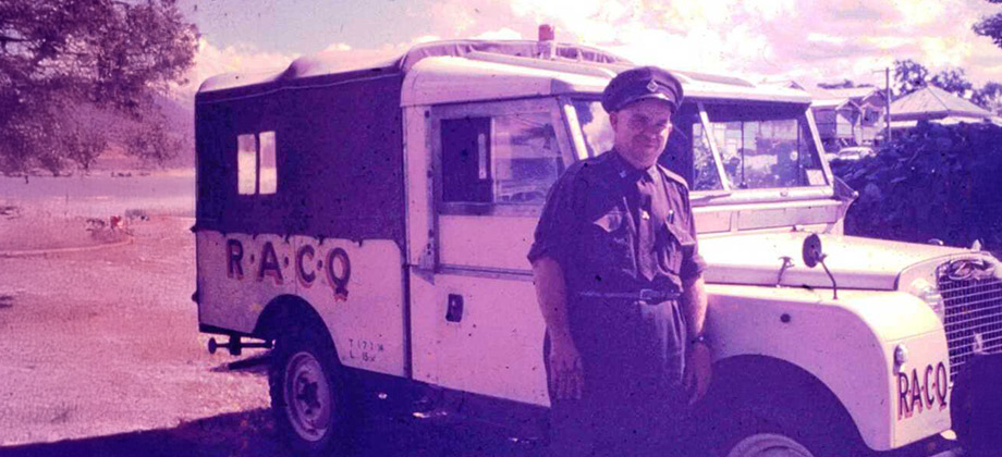 Photo of Ernie Whitehead with 1957 patrol vehicle