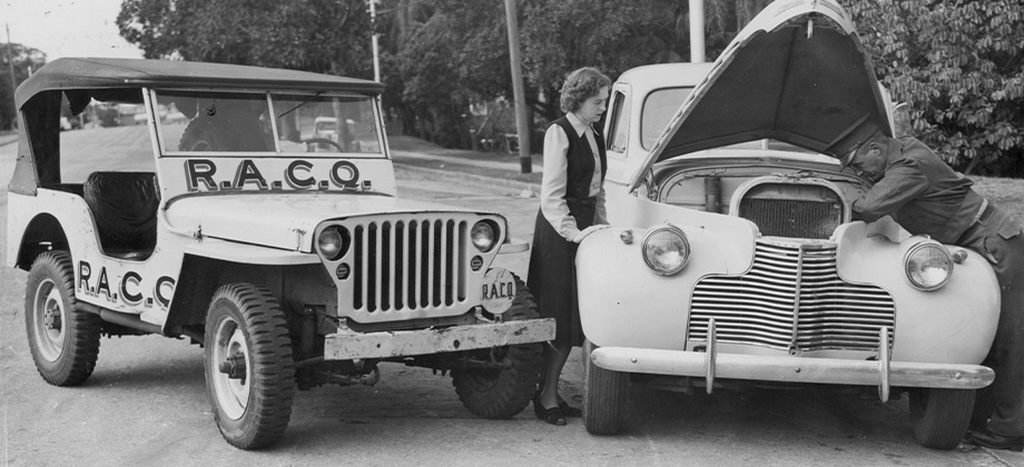 Vintage photo of roadside patrol helping member