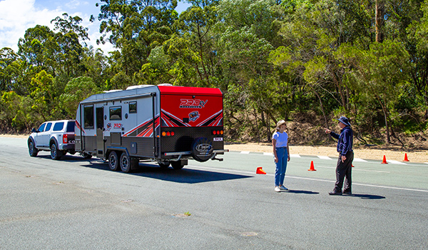 car-with-trailer-2-people