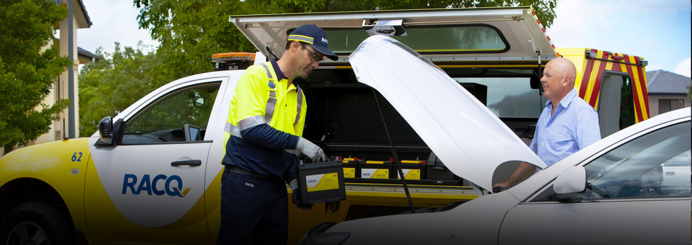 RACQ-technician-installing-a-new-car-battery-gradient-1410x500