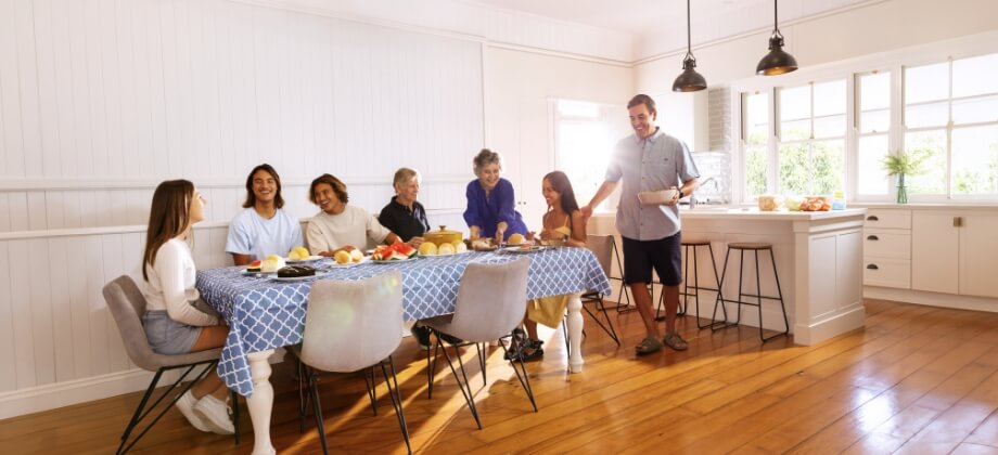 Family inside at table having meal