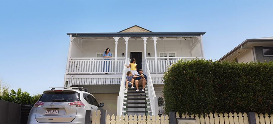 Young family outside of their home