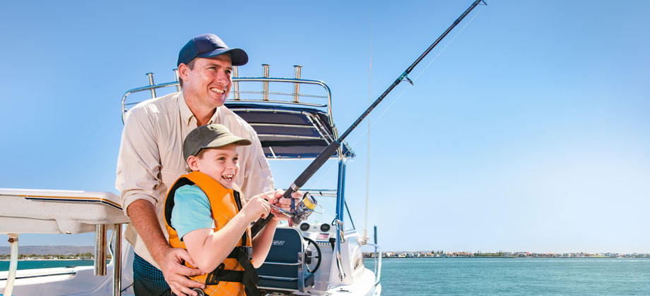 father-and-son-on-fishing-boat