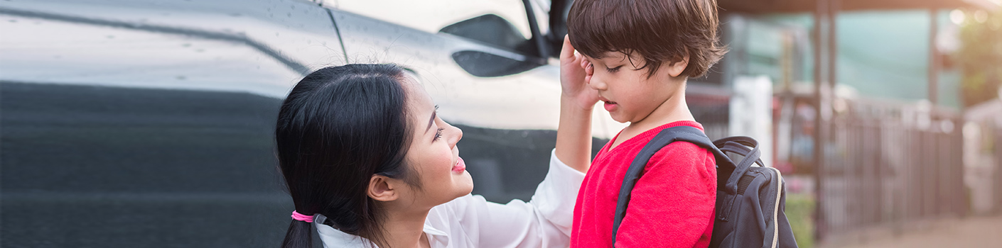 Mother-and-son-outside-of-school-1410x350