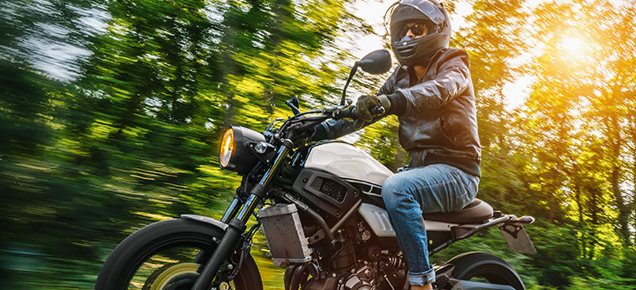 Motorbike riding on country road
