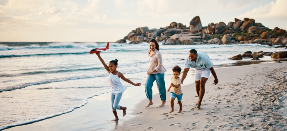 Family playing on beach