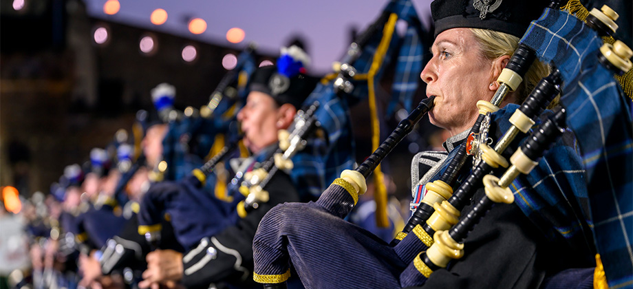 The Royal Edinburgh Military Tattoo event woman playing bag pipes