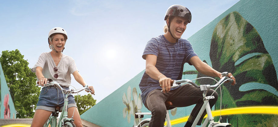 Young people on bike having fun