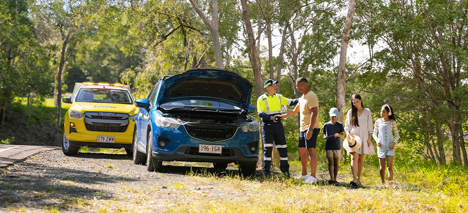 Family getting helped by RACQ in the bush