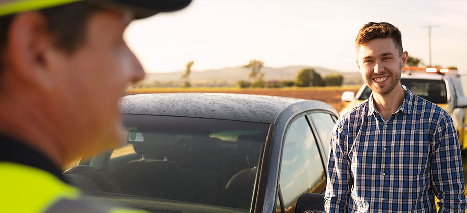 Roadside patrol helping young man