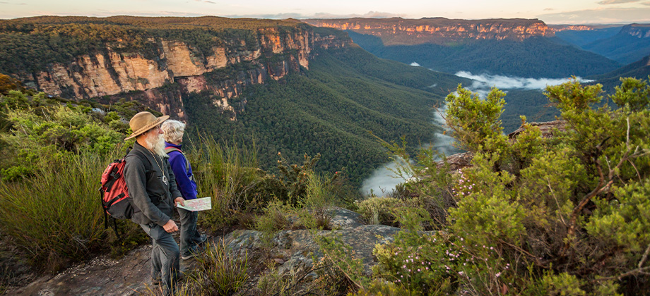 senior couple looking at view while bushwalking in australia