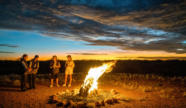 people at campfire