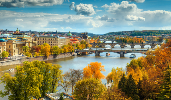 scenic autumnal view of Prague, Czech Republic, featuring the Charles Bridge