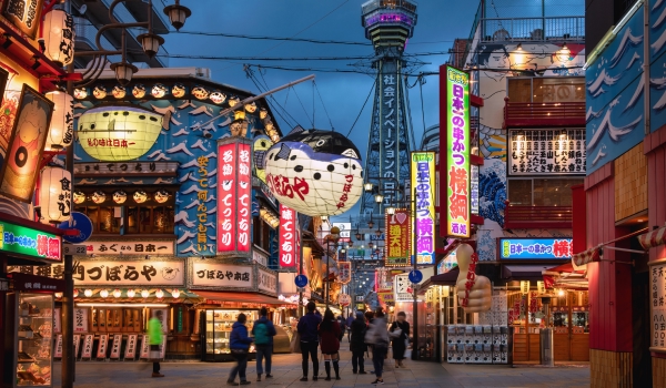 Osaka dotonbori street at night with lit lanterns and signs