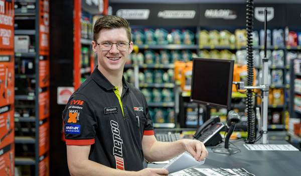 repco worker at counter