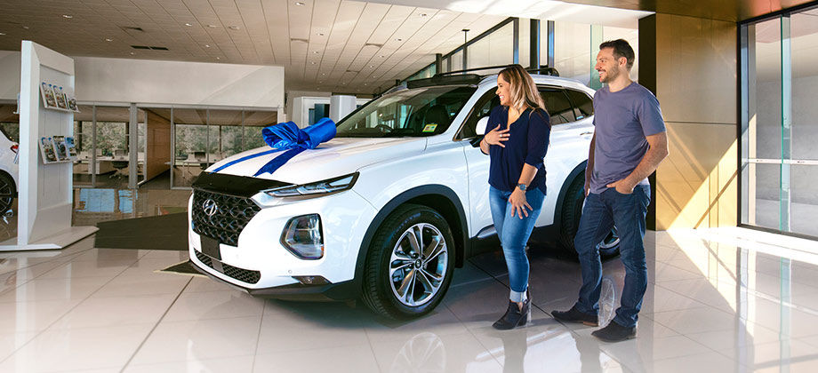 Couple buying new car